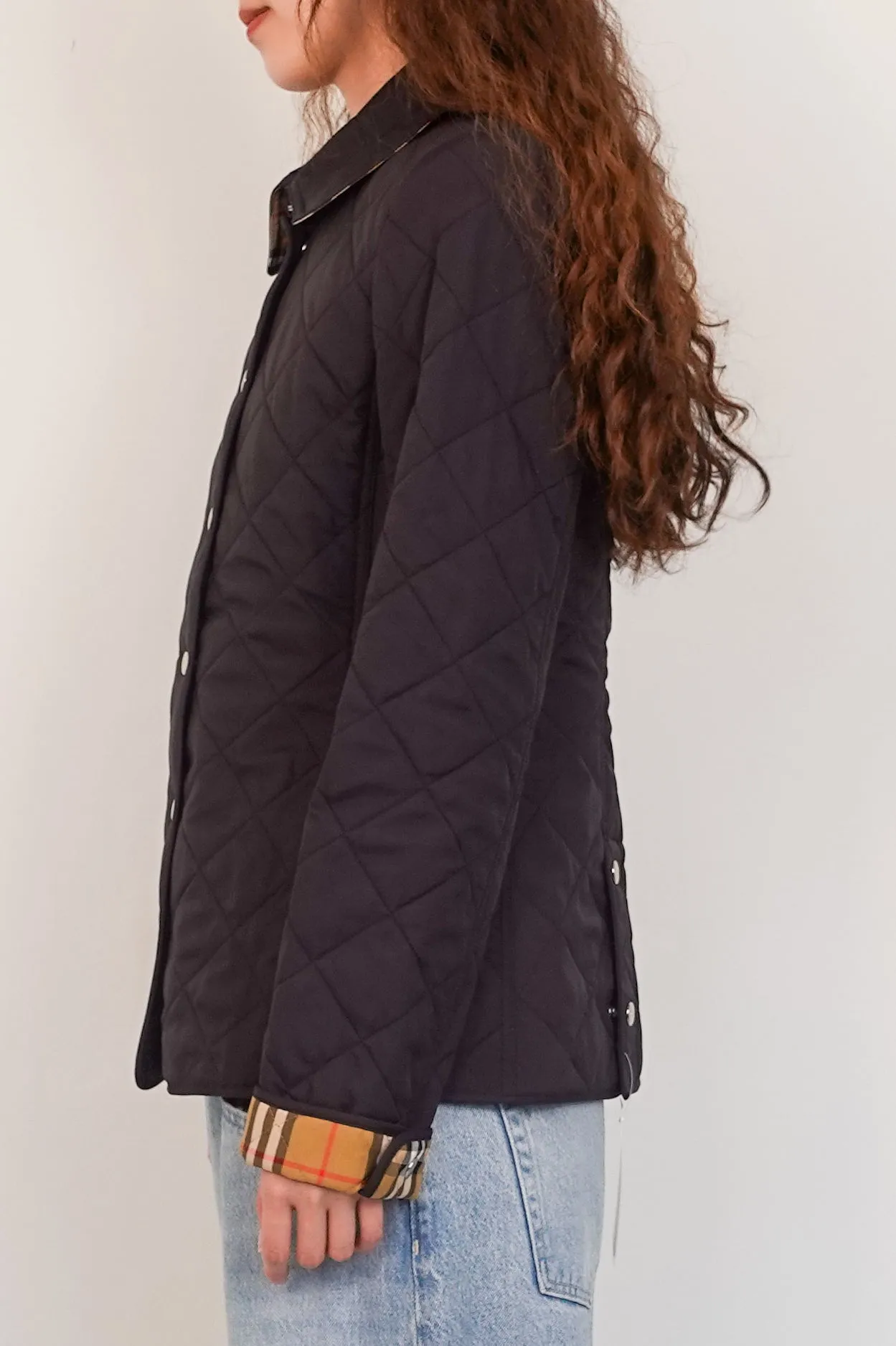 Black quilted short coat RRP £900