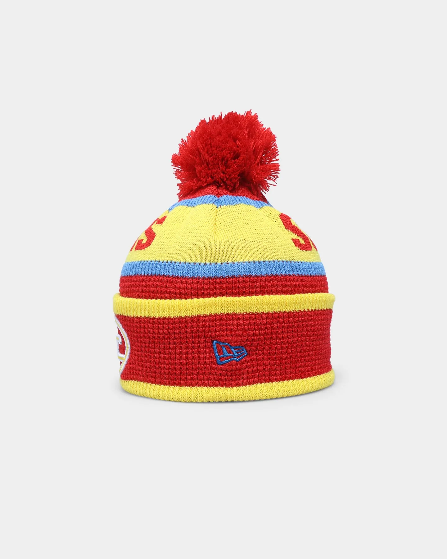 New Era Gold Coast Suns AFL Opening Bounce 2022 Pom Waffle Wordmark Beanie Red/Yellow